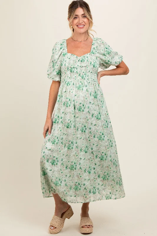 Maternity dress for a baby's first visit to the museum Green Floral Smocked Sweetheart Neck Short Puff Sleeve Maternity Midi Dress Maternity dress for a baby's first visit to the museum Green Floral Smocked Sweetheart Neck Short Puff Sleeve Maternity Midi Dress